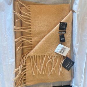 Saks Cashmere scarf. Light tan / camel  color. 67 by 11 with 3” fringe. NWT